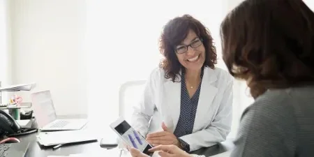 Doctor having a meeting with a patient.