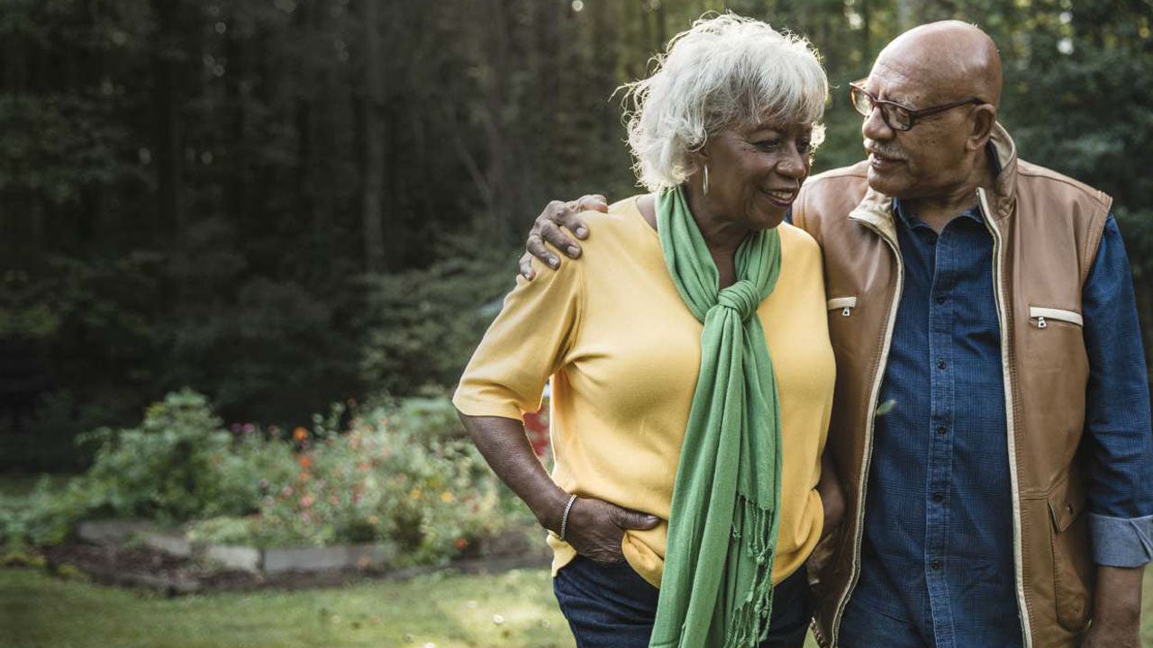 older couple taking a walk - cover of IBE patient brochure